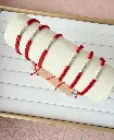 Pulsera plata hilo rojo balines.webp