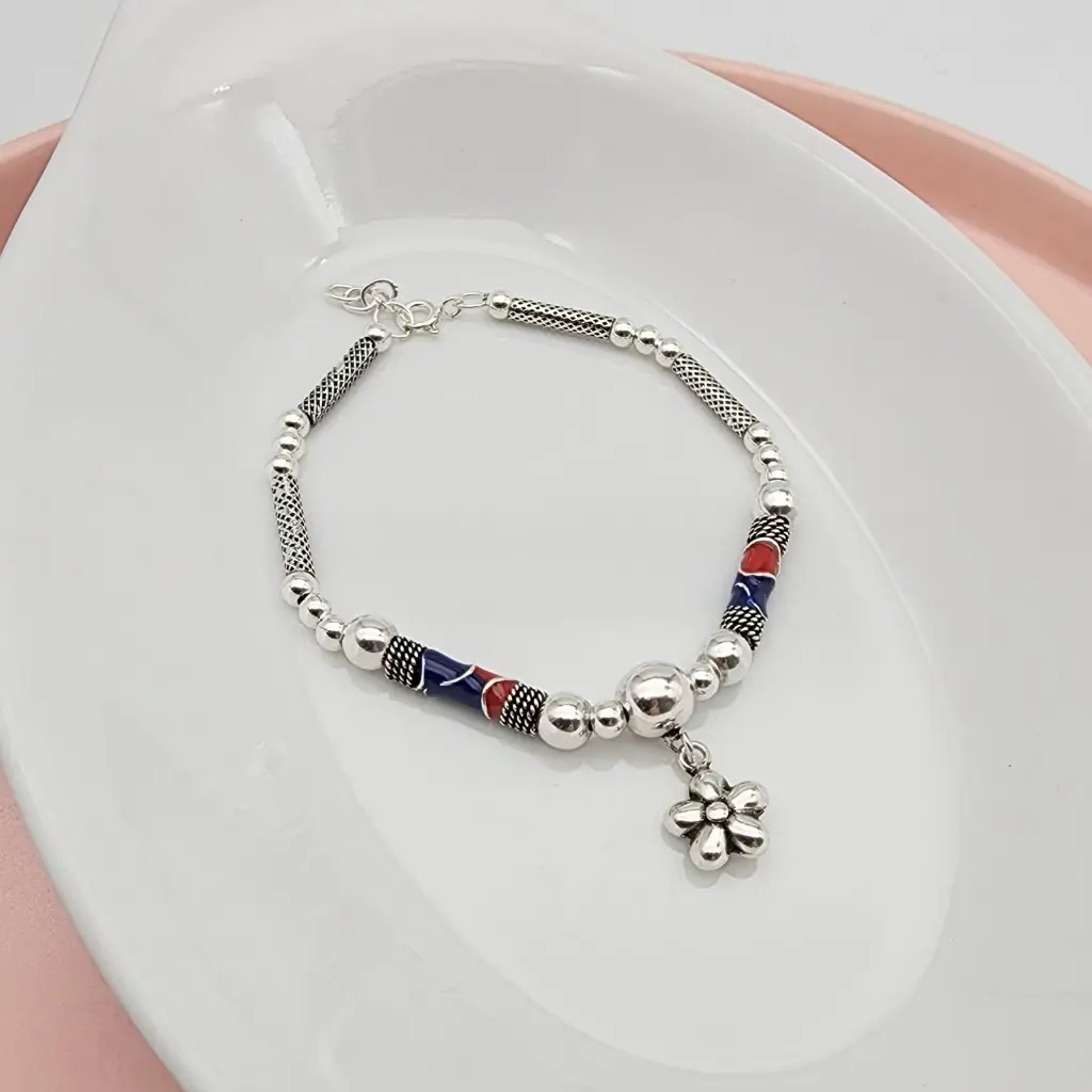 pulsera plata quemada flor.webp