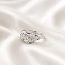 ANILLO PLATA CRISTALES OVALOS BLANCOS.webp