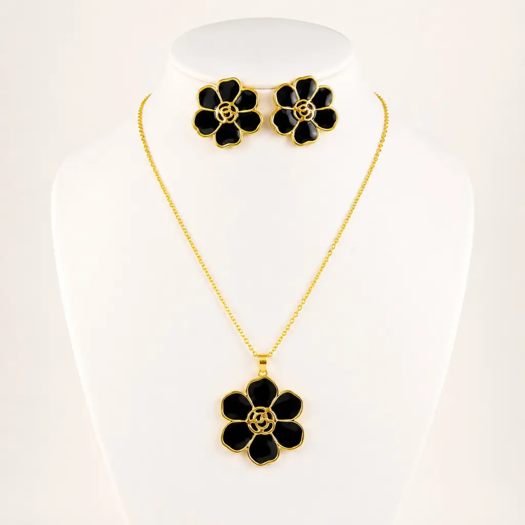 Juego en acero dorado flor esmaltad.webp
