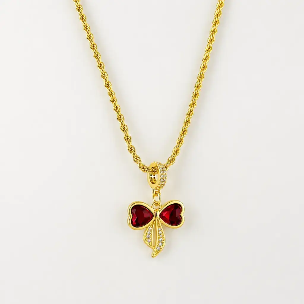 [G-CDD-239] Cadena en rodinado gold cadena especial dije microcirconia lazo circones rojos.webp