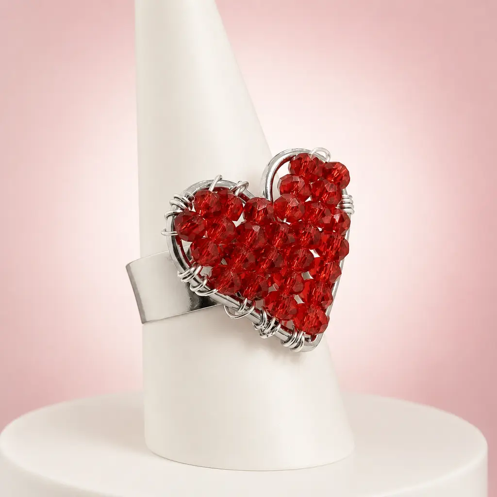 [AC-AN-122] Anillo en acero silver ajustable corazón cristales rojos tejido a mano.webp