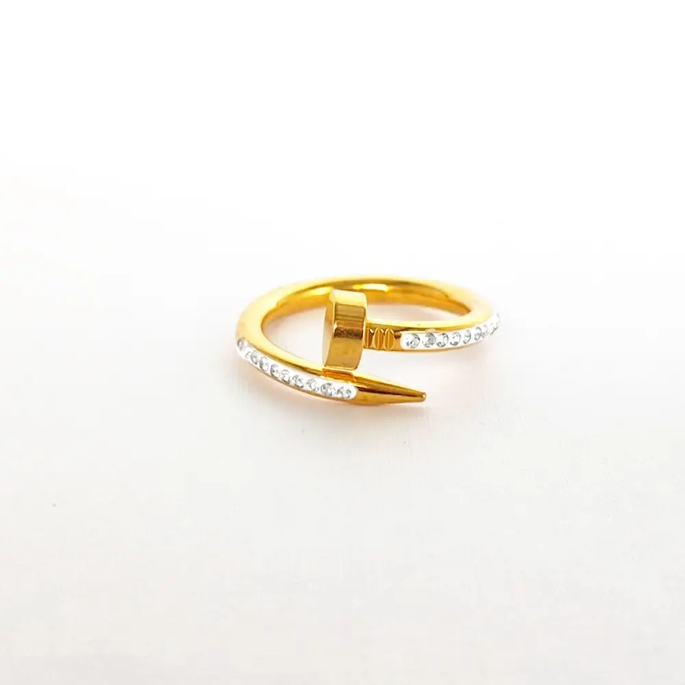 *ANILLO EN ACERO GOLD CLAVO CARTIER