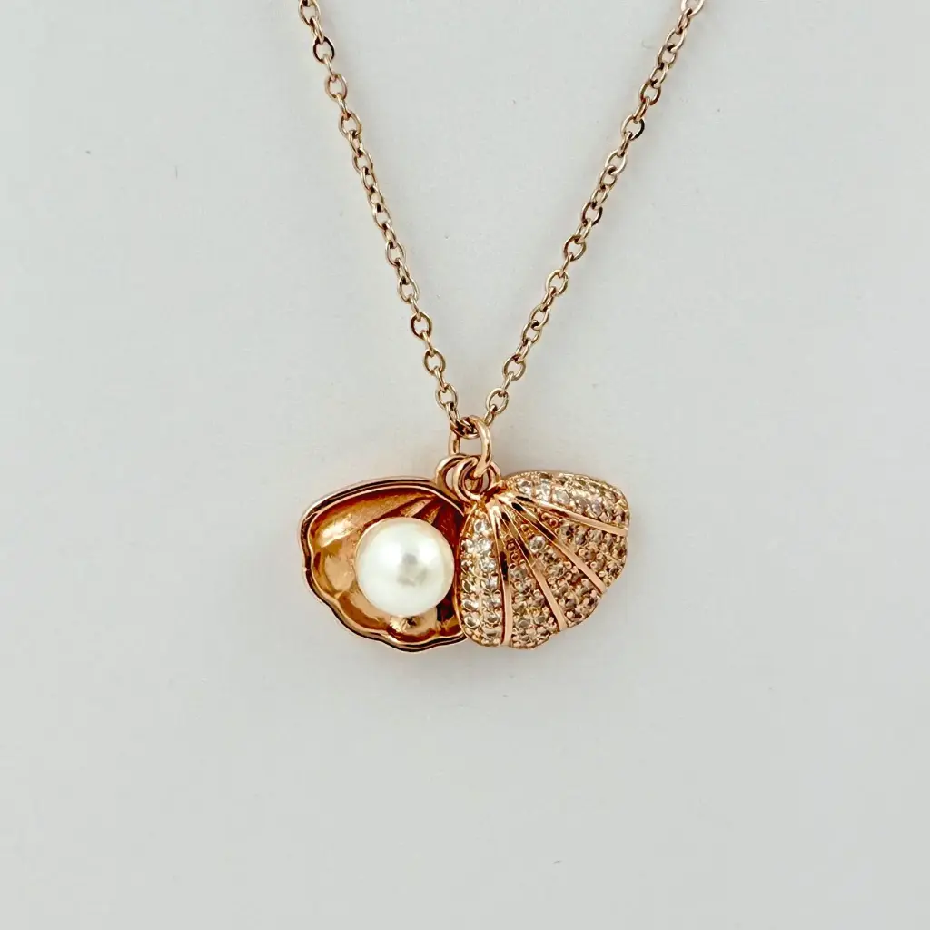 *CADENA CON DIJE EN ACERO GOLD ROSE CONCHA PERLA