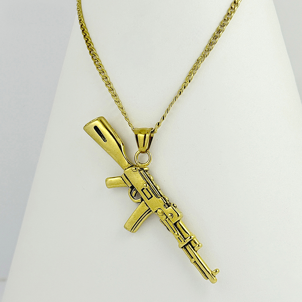 Cadena con dije en acero gold / silver pistolas 60 cm
