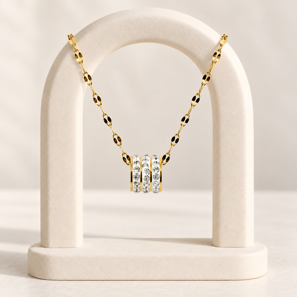 Collar en acero gold dije cilindro microcircones blancos