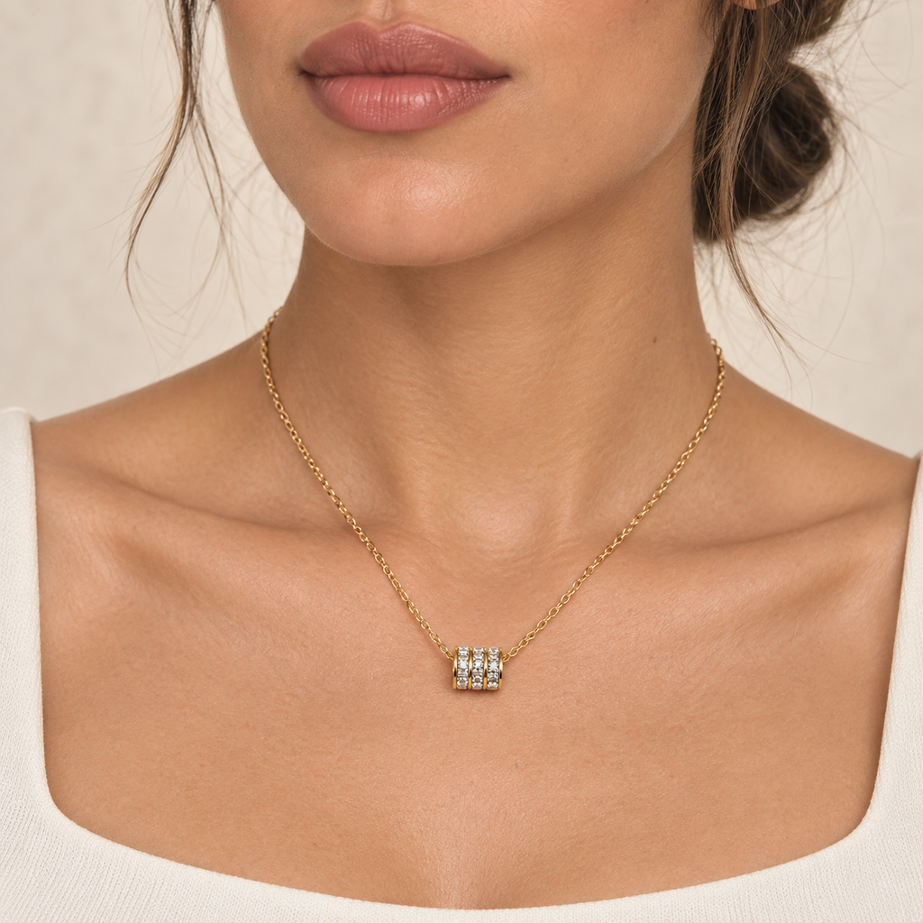 Collar en acero gold dije cilindro cristales baguette modelo 2