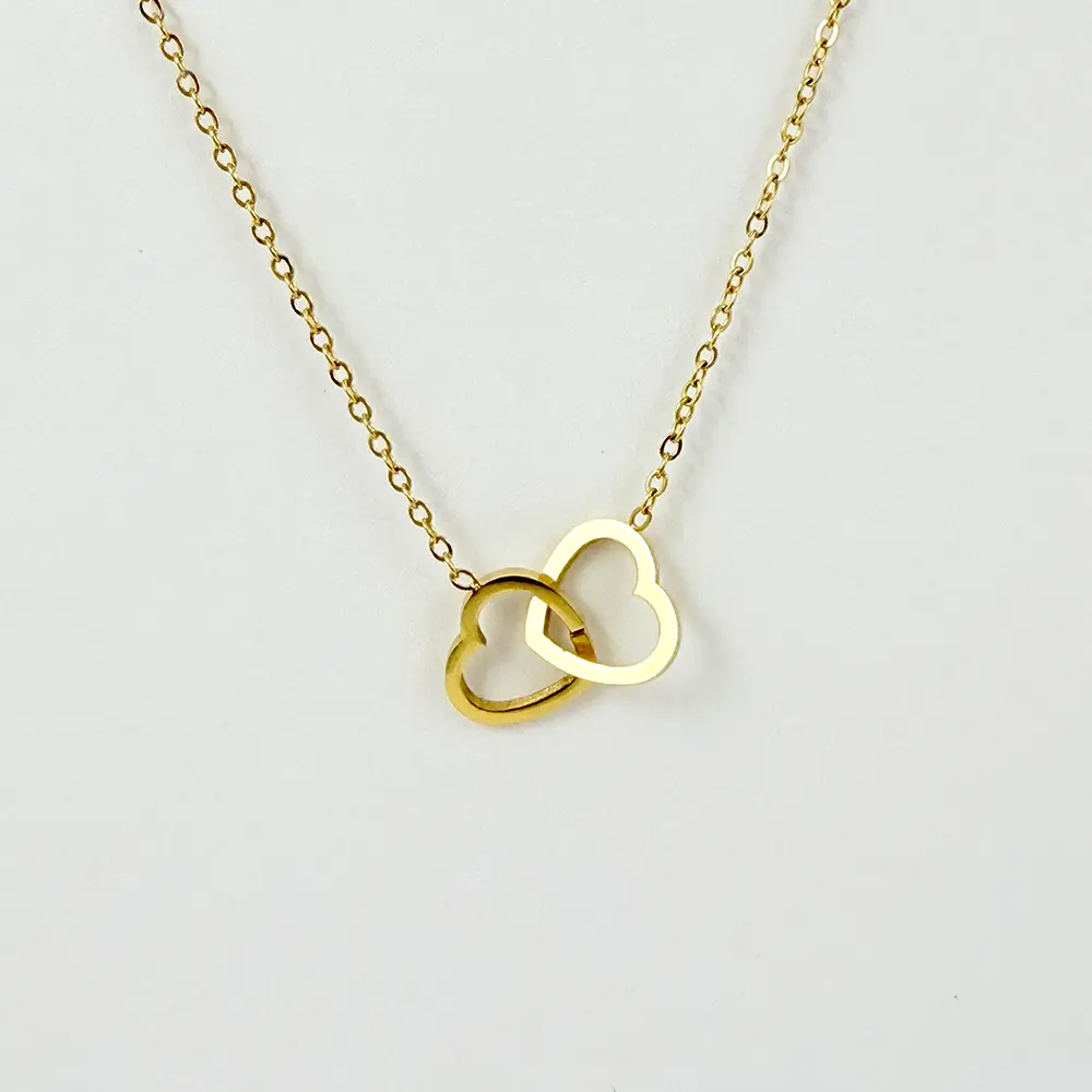 Collar en acero gold dije corazones alianzas