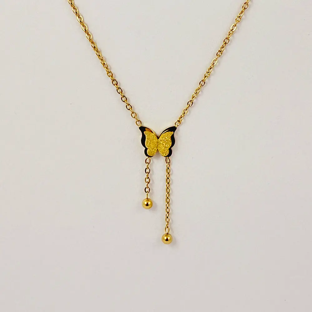 Collar en acero gold dije mariposa satinado