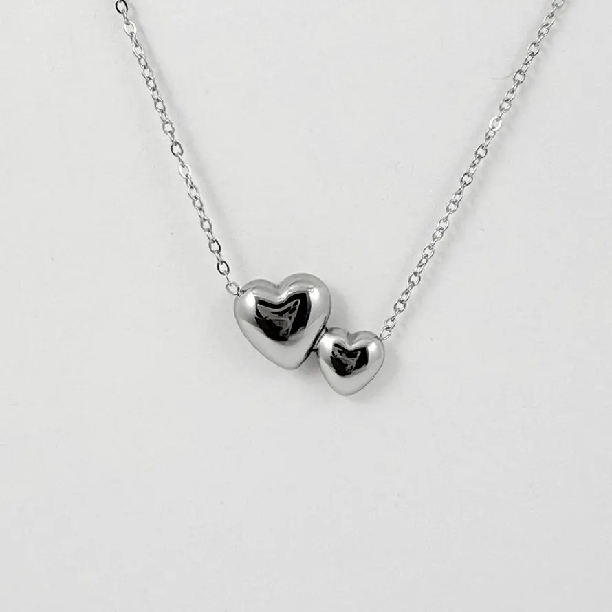 Collar en acero silver dijes corazones doble