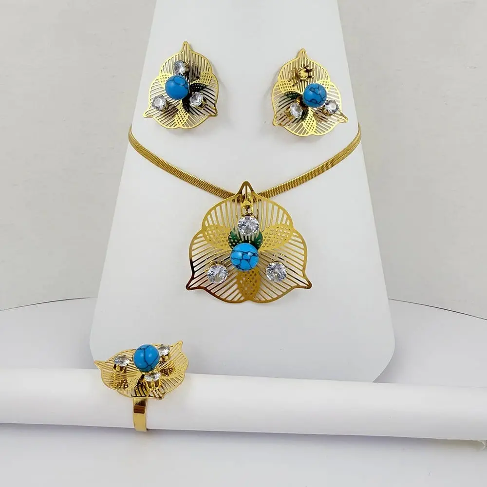 Juego acero gold con anillo flor pétalos piedra turquesa