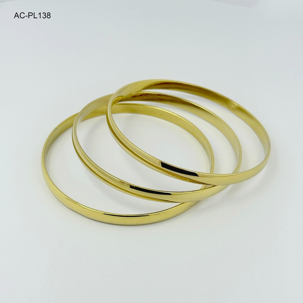 Brazalete en acero gold trio