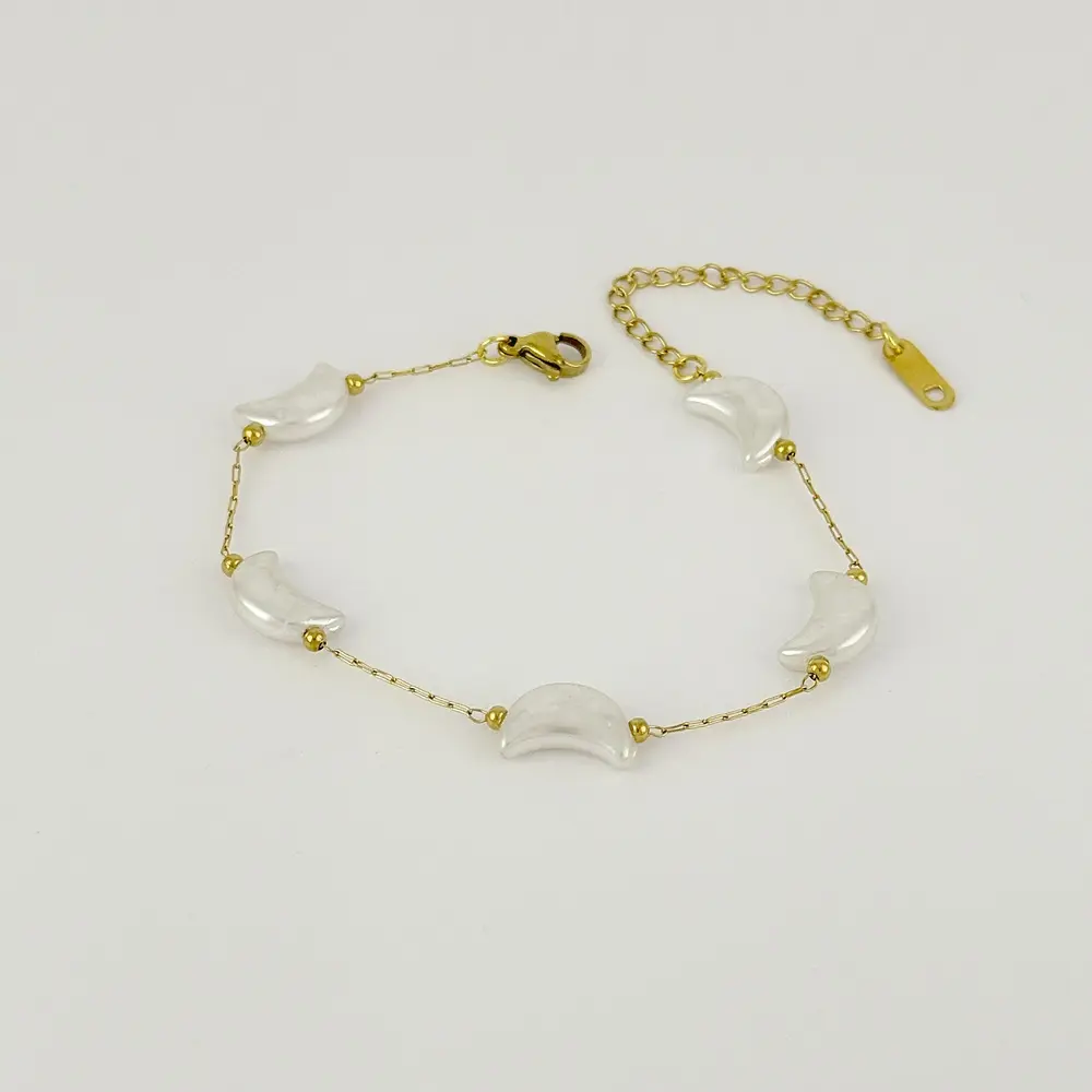 Pulsera en acero gold luna perlas