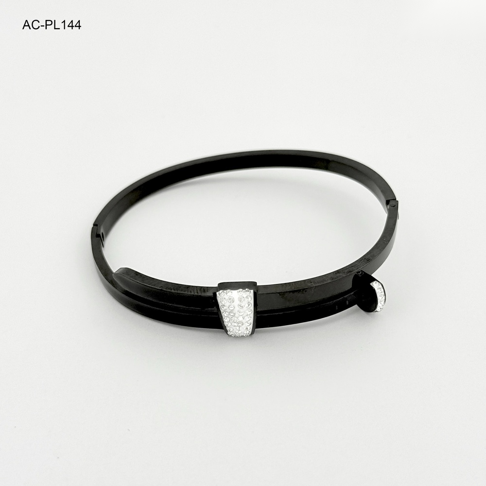 Brazalete en acero negro pavonado clavo cartier circones