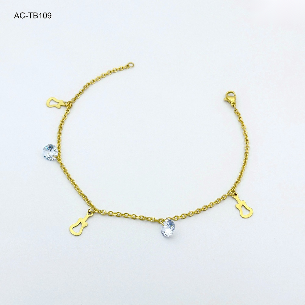 Tobillera en acero gold cristal dije figura