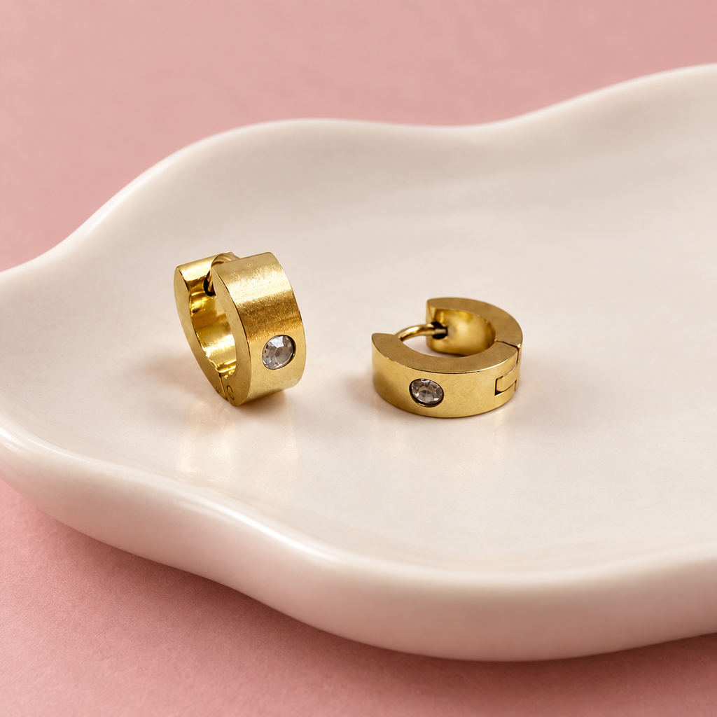 Argolla gold huggie circon 1cm acero