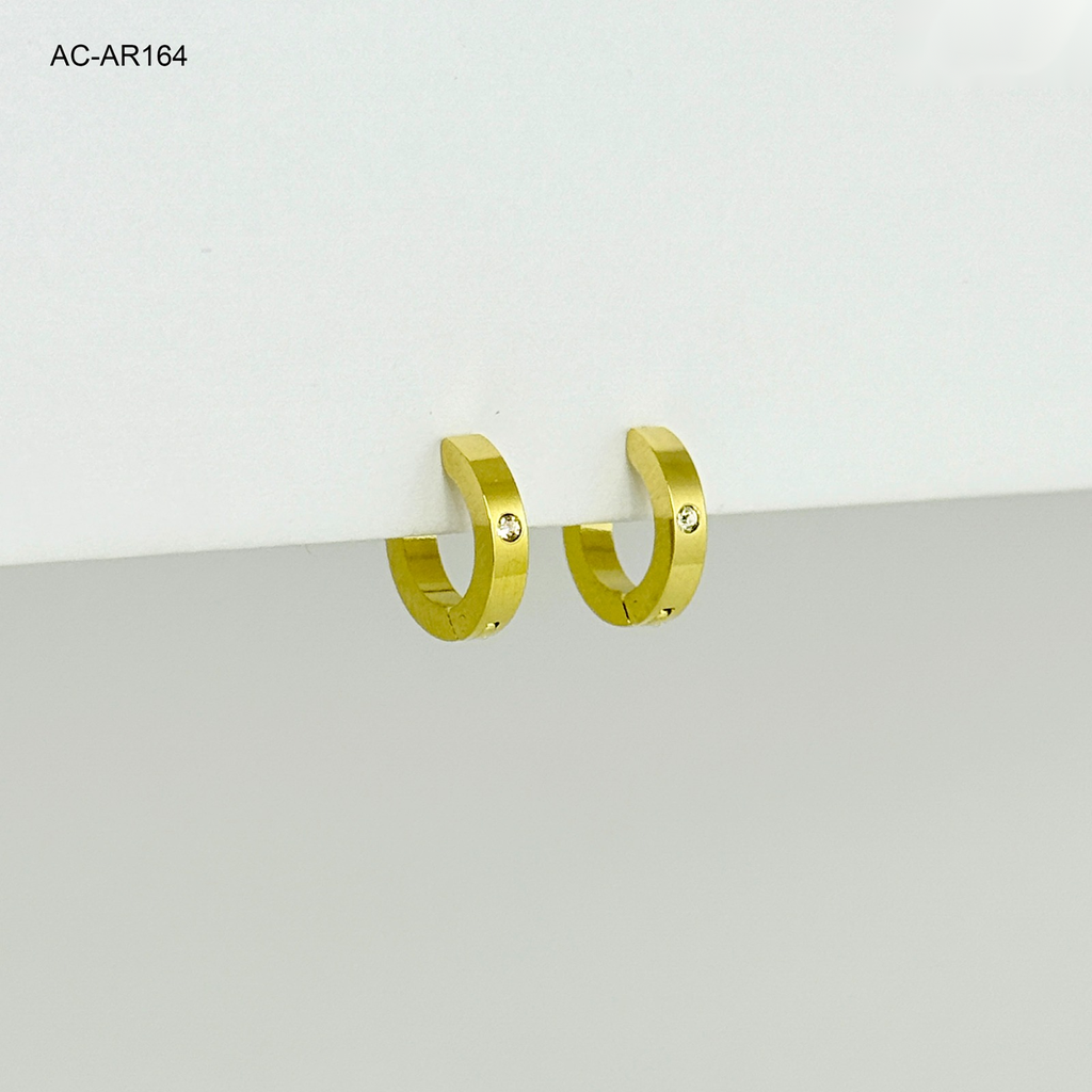 Argolla gold huggie lisa circon 1,3cm acero