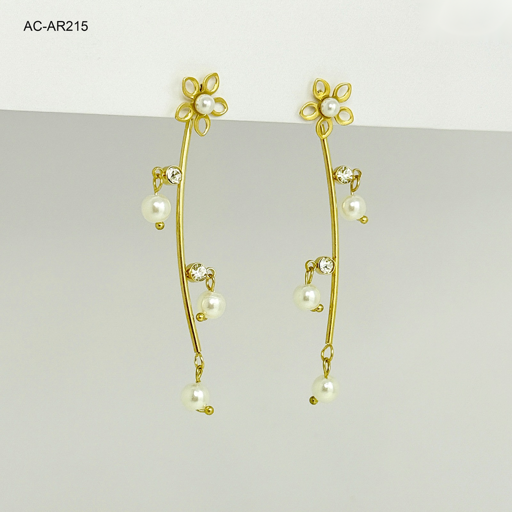 Arete largo gold palo perlas topo flor acero