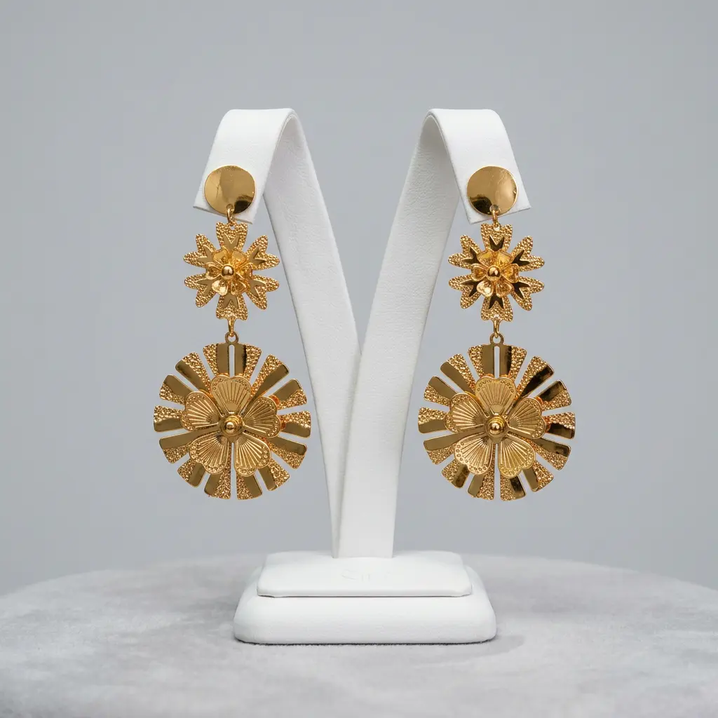Aretes largos en acero gold flores 