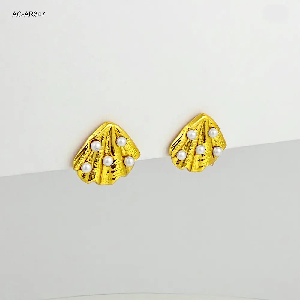 Maxi topo en acero gold conchita perlas