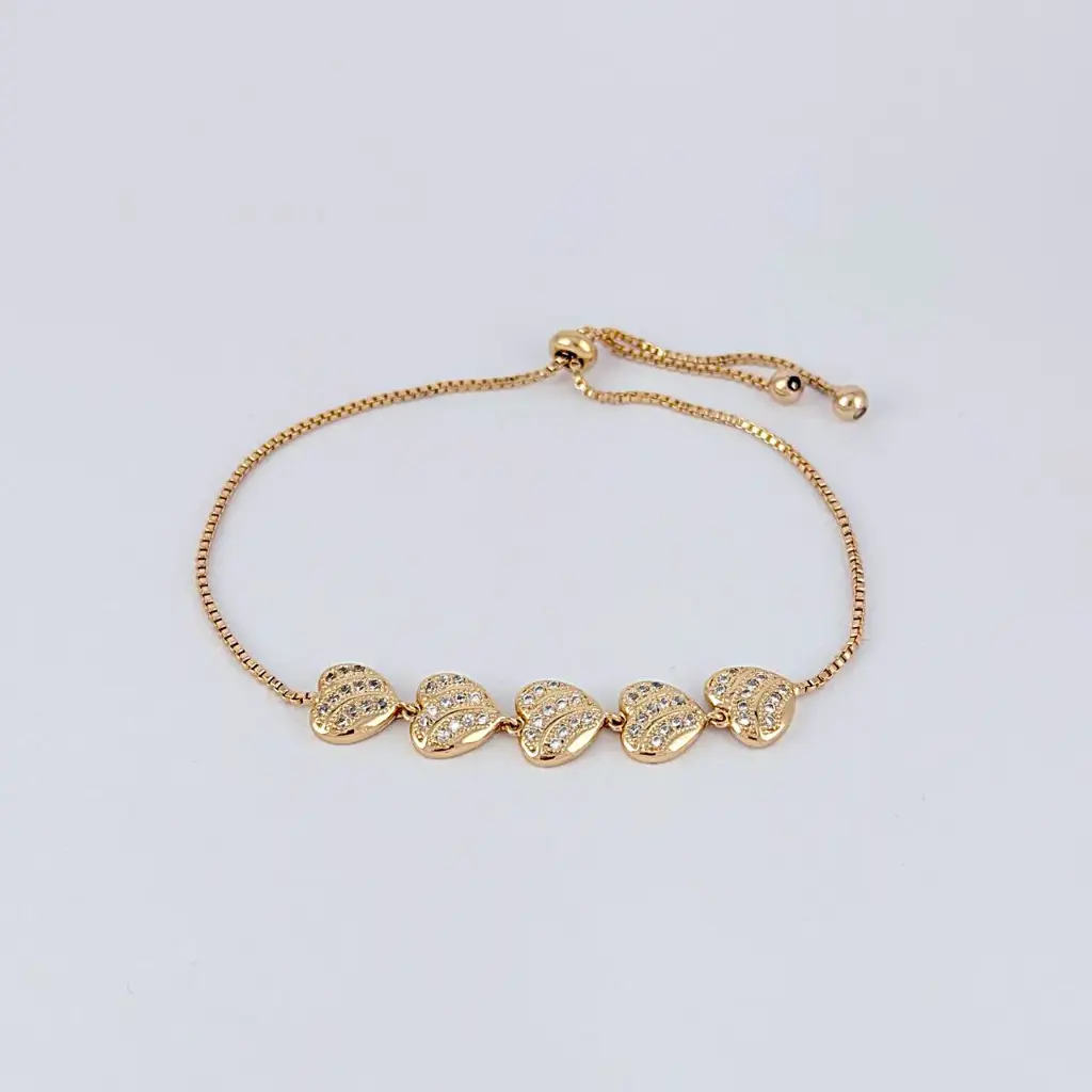 Pulsera en rodinado gold sistema ajustable corazones microcircones blancos