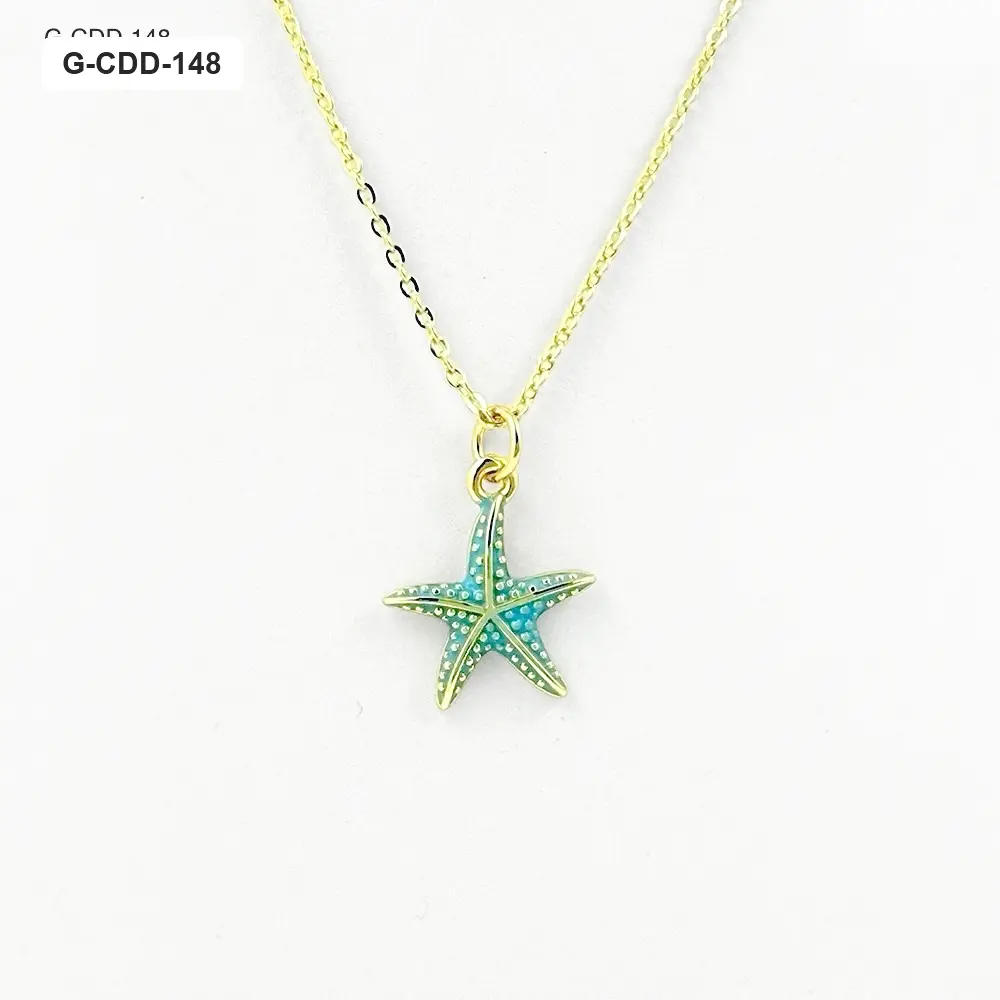 *COLLAR EN RODINADO GOLD DIJE ESTRELLA DE MAR ESMALTADO TURQUESA