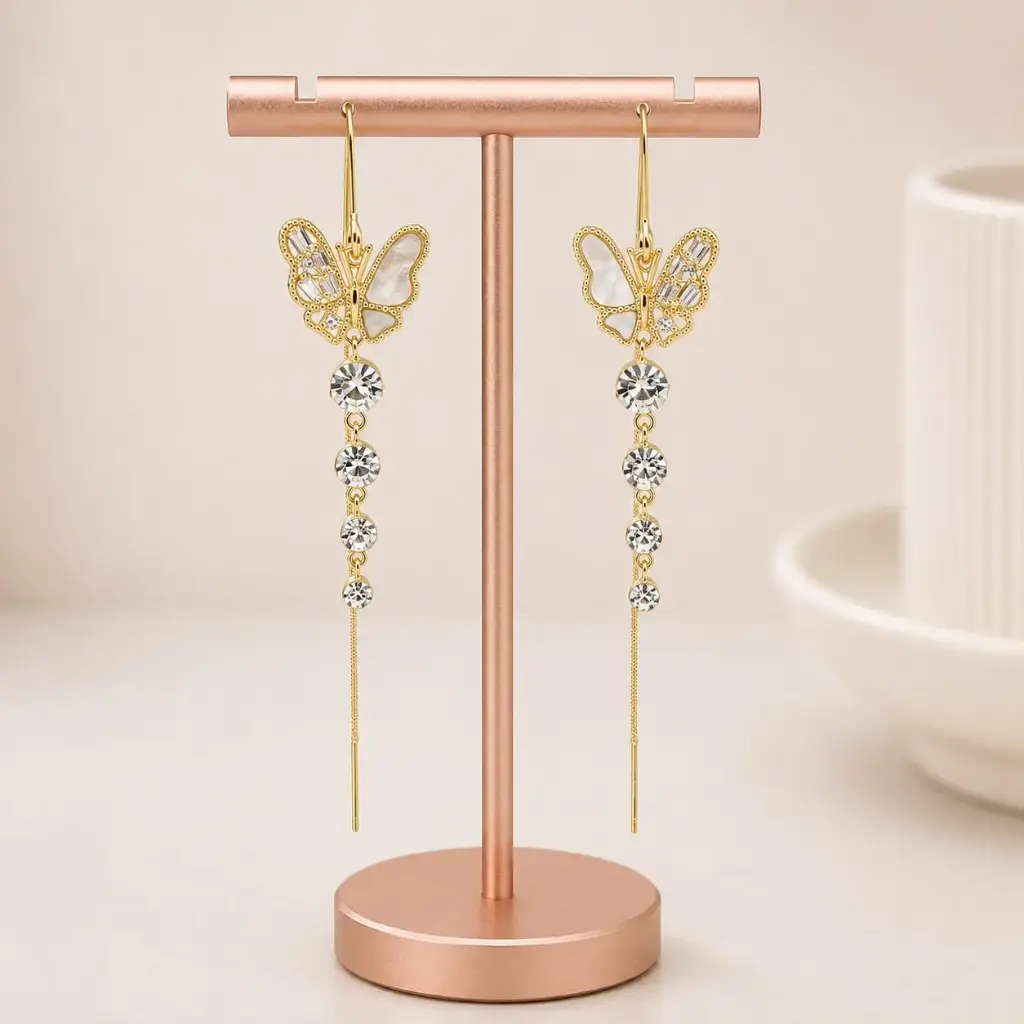 Aretes largos en rodinado gold línea premium broche sistema pasar mariposa circones nácar 