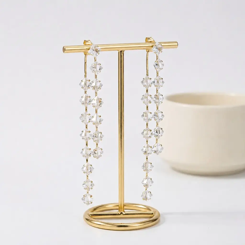 Aretes largos en rodinado gold línea premium broche poste