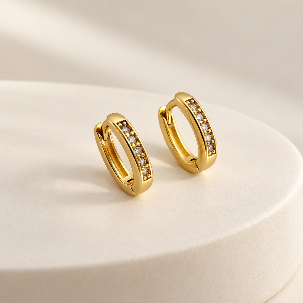 Argollas huggie rodinado gold ovalada 1 cm