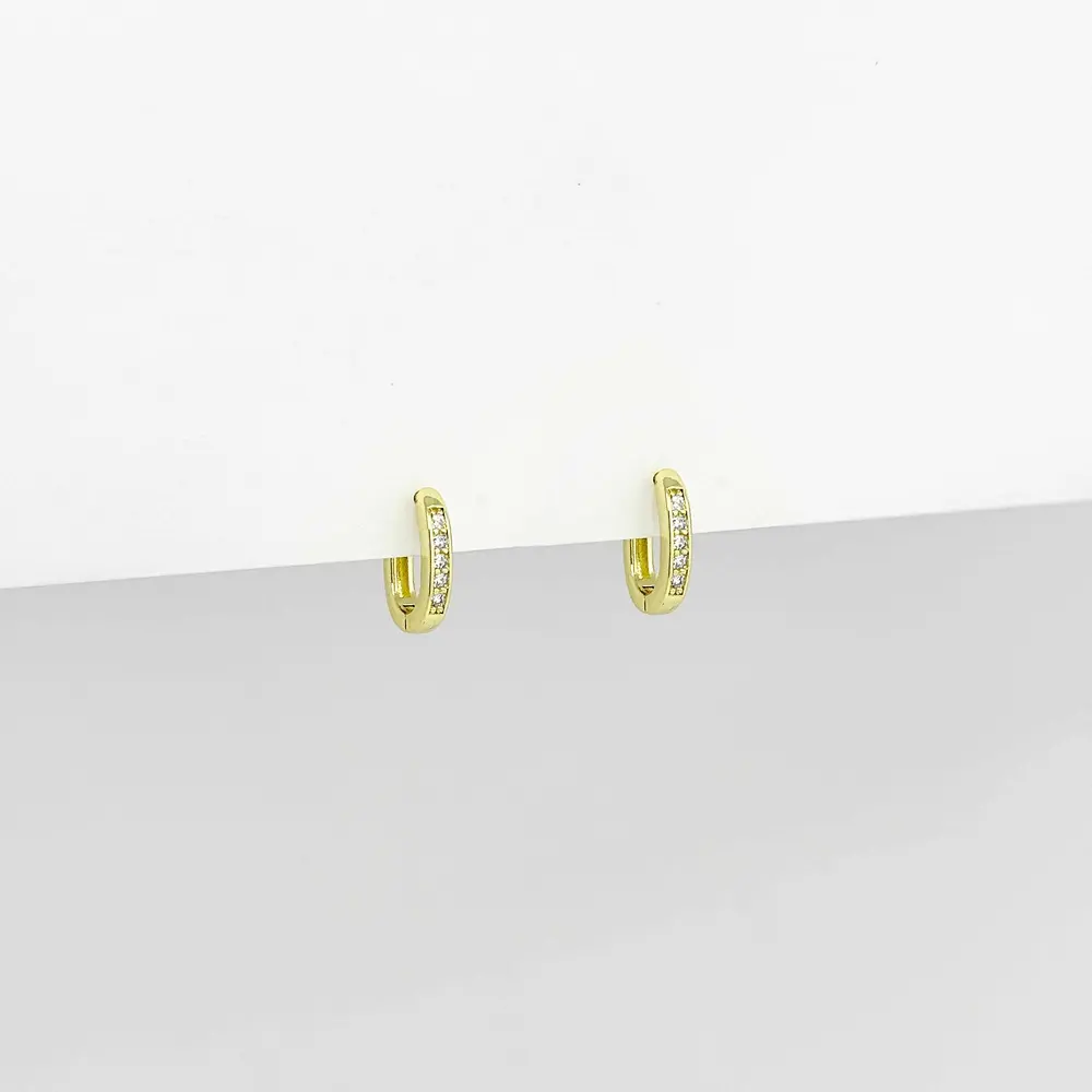 Argollas huggie rodinado gold ovalada 1.4 cm