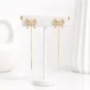 Aretes largos en rodinado Gold línea premium broche sistema pasar moño / lazo cristales 