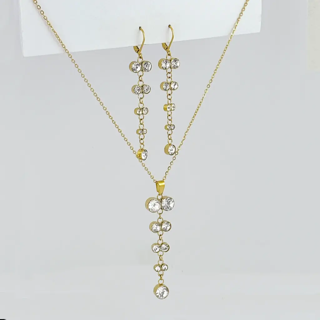 Juego acero gold aretes largos circones blanco