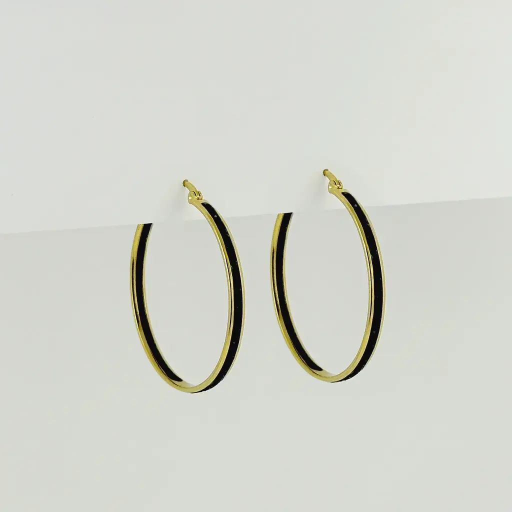Argolla en acero gold circonia negro