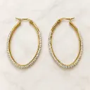 Argolla en acero gold especial 316L ovaladas circones blancos
