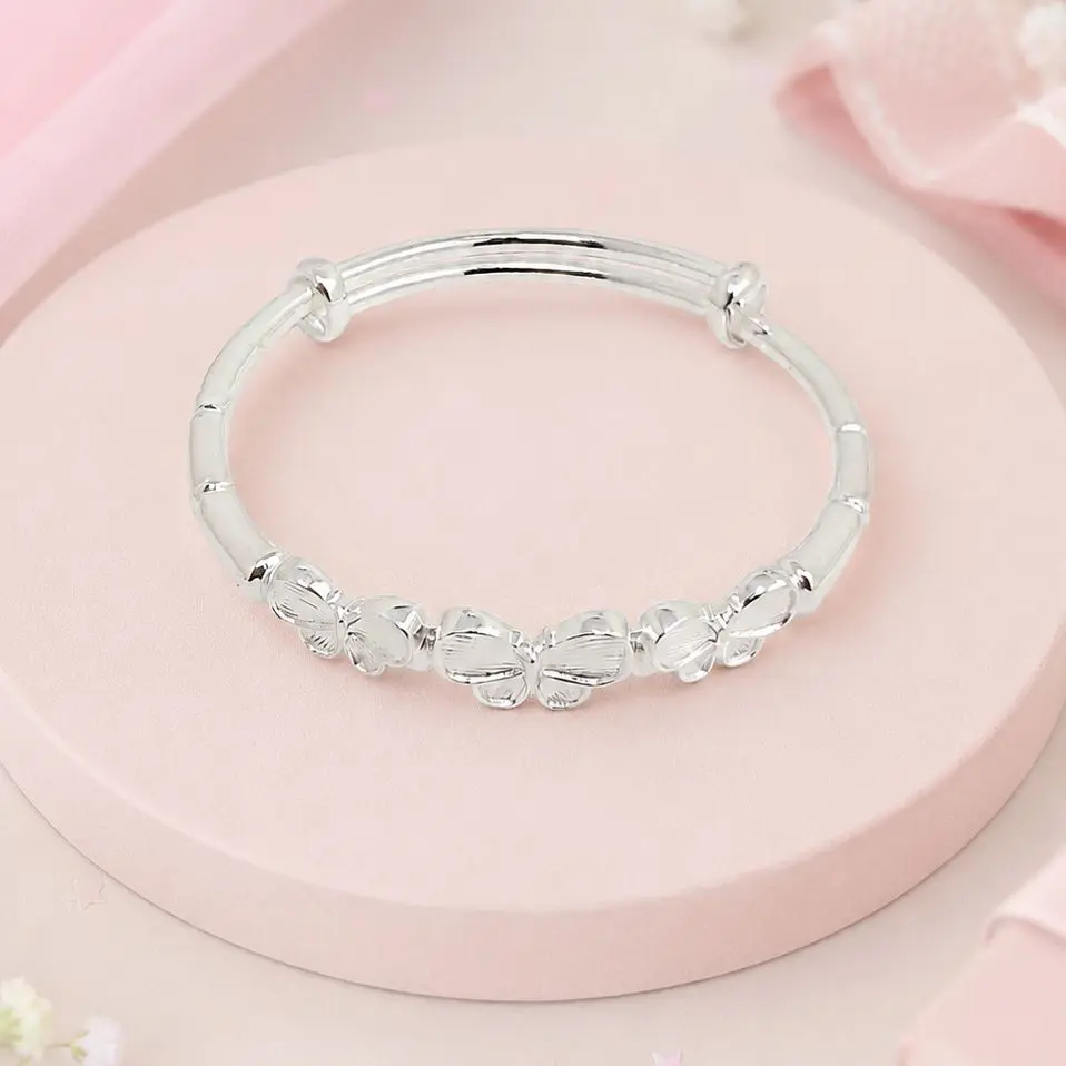 Brazalete para niñas en Plata ley 925 rigido tres mariposas
