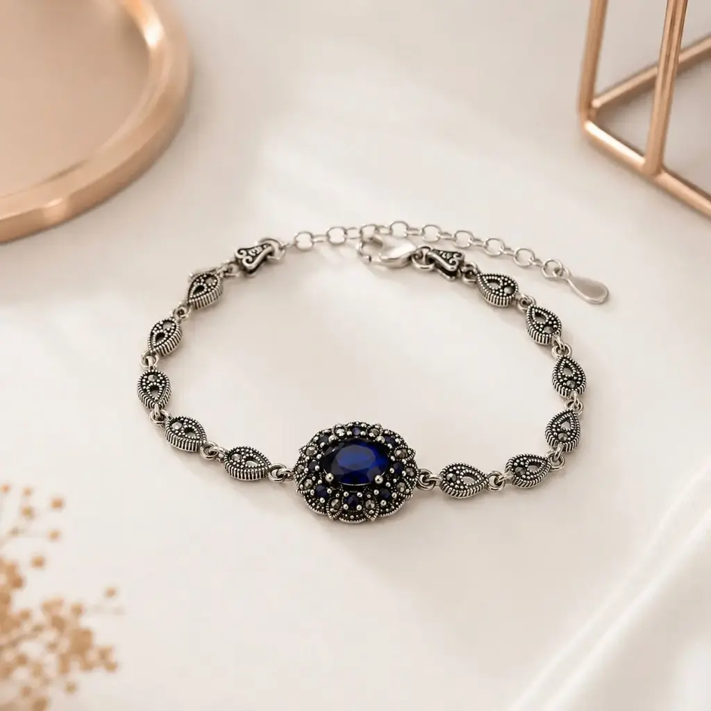 Pulsera plata quemada ley 925 marquesita ovalo cristal azul