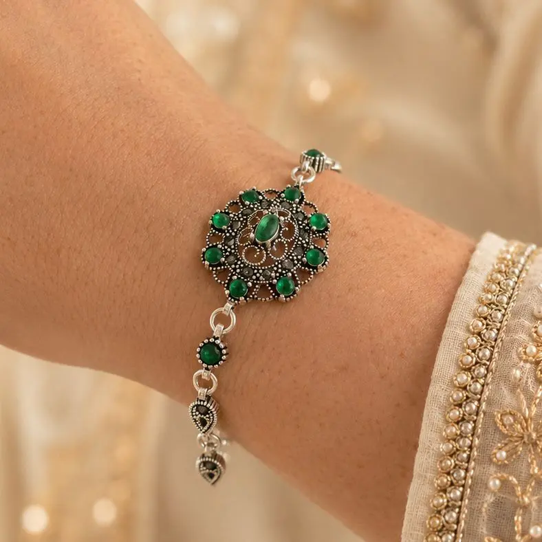Pulsera plata quemada ley 925 marquesita flor circones verdes / azules