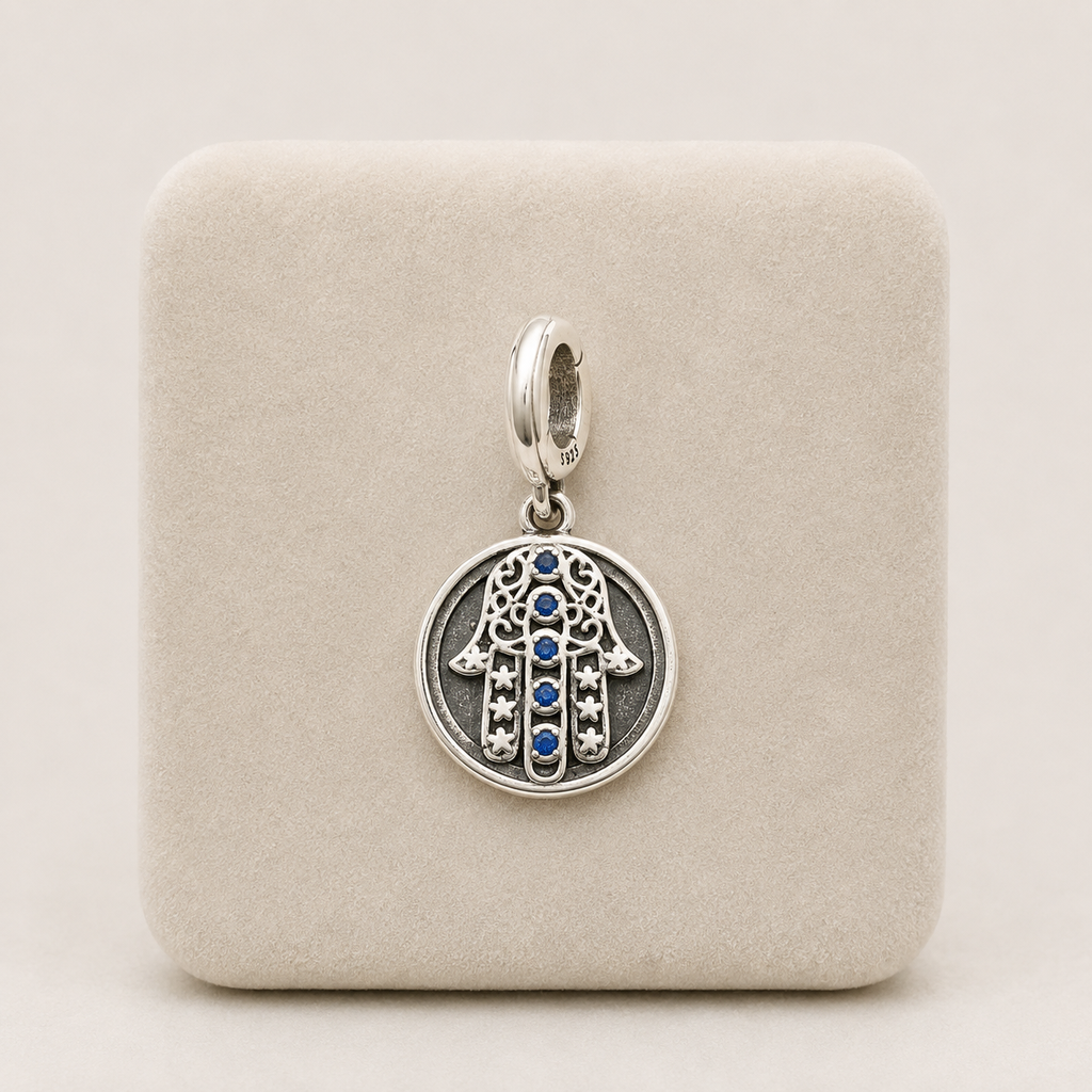 Dije en plata ley 925 manito hamsa