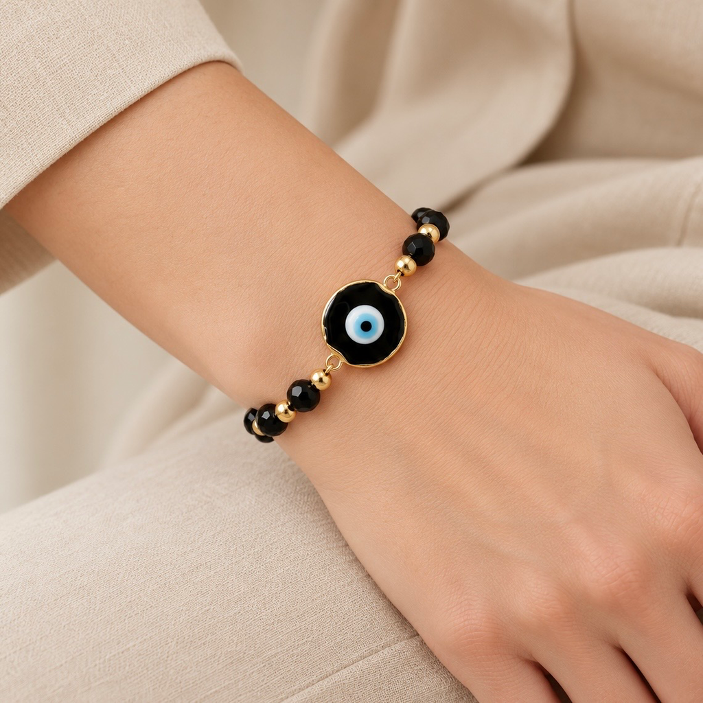 Pulsera Artesanal dije ojito resina piedra negra 