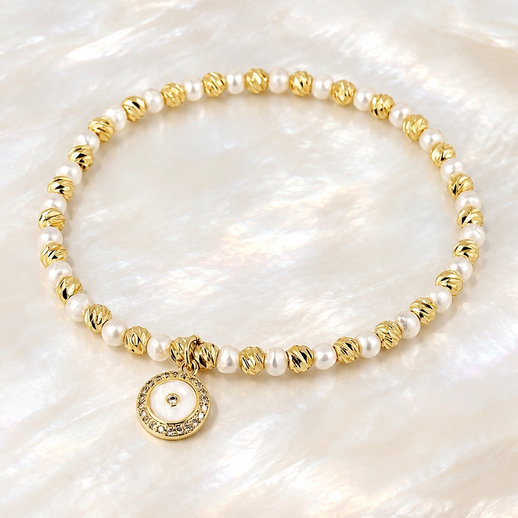 Pulsera en rodinado gold perla natural de río dije círculo