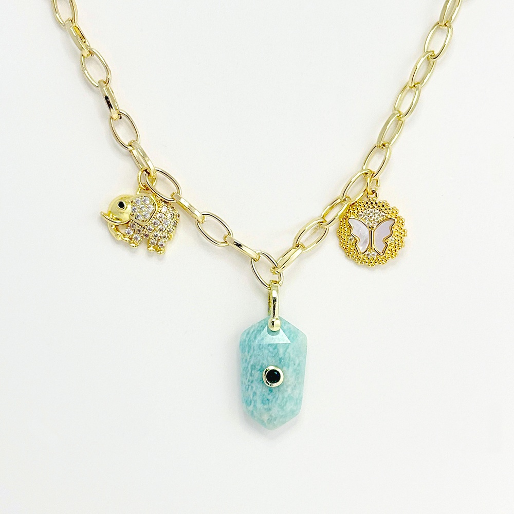 Collar en rodinado gold charms cuarzo turquesa / azul dos dijes