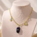 Collar en rodinado gold charms cuarzo turquesa / azul dos dijes