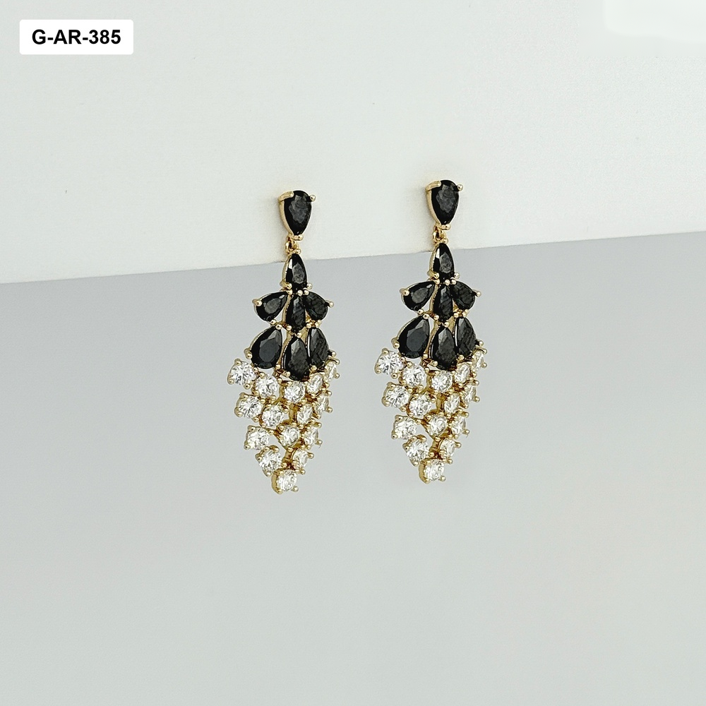*Aretes en rodinado gold largos cristales blancos y negros