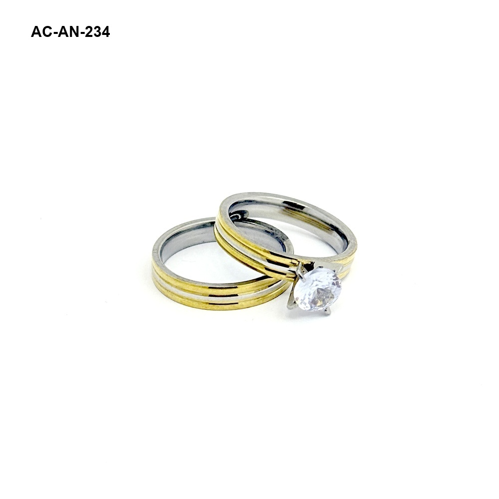 Anillo en acero bicolor pisargolla juego x2 modelo 2
