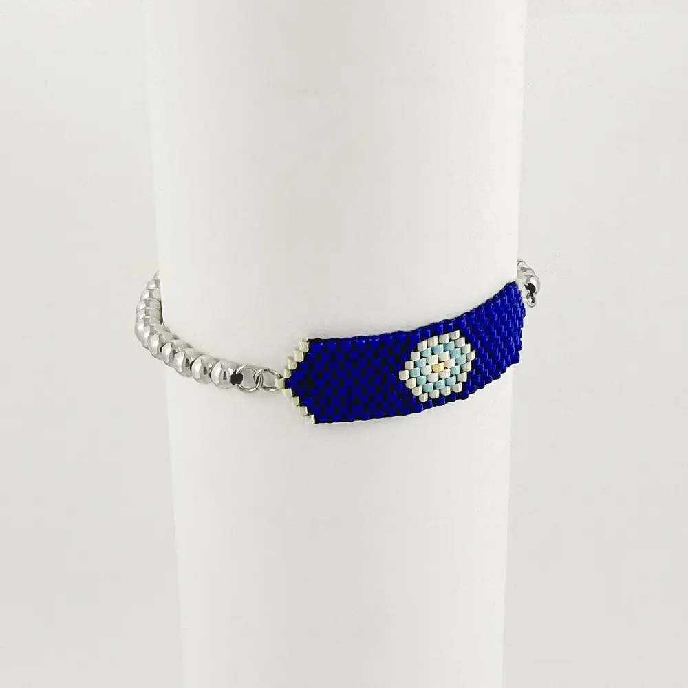 Pulsera en rodinado silver ajustable balines ojito azul tejido en miyuki