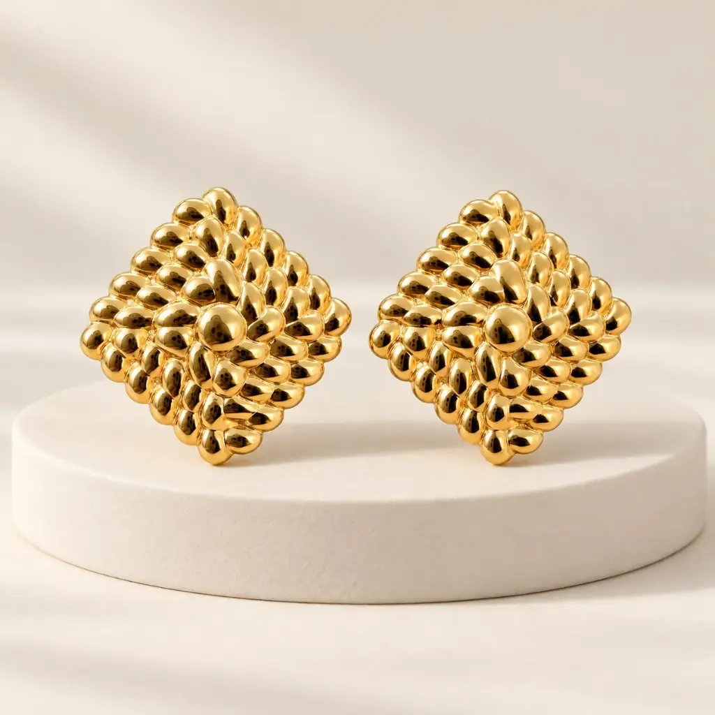 Maxi aretes en acero gold rombo texturizado