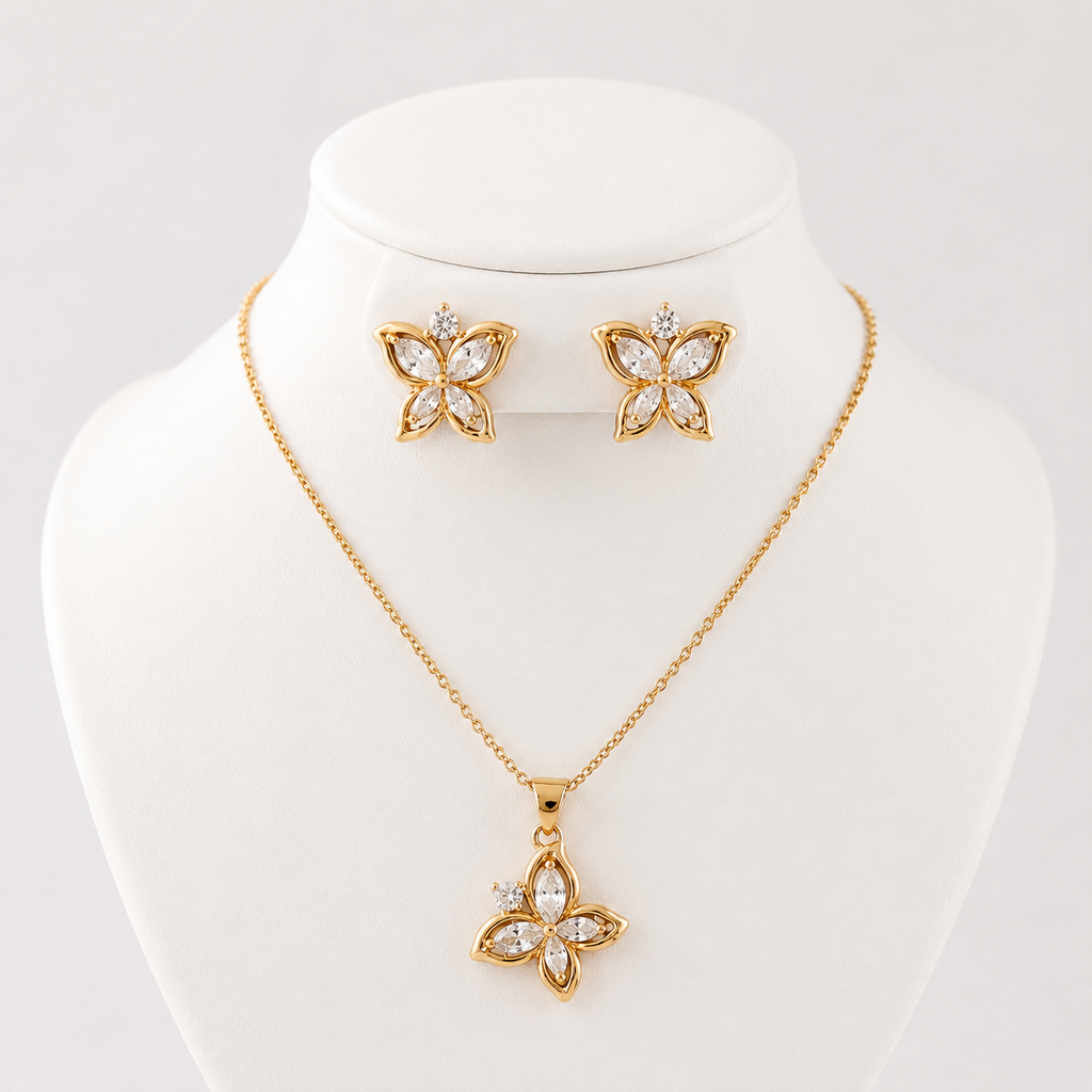 Juego en Rodinado Gold Champagne microcirconia Mariposa