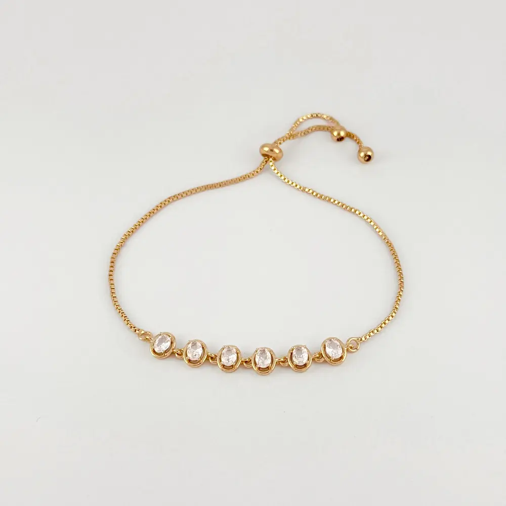 Pulsera en Rodinado Gold Champagne ajustable ovalos cristales blancos