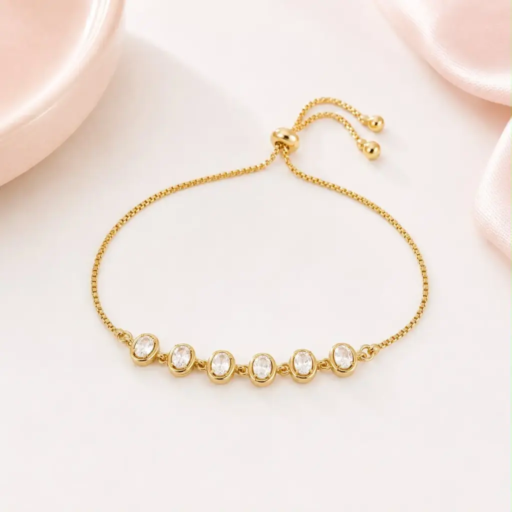 Pulsera en Rodinado Gold Champagne ajustable ovalos cristales blancos