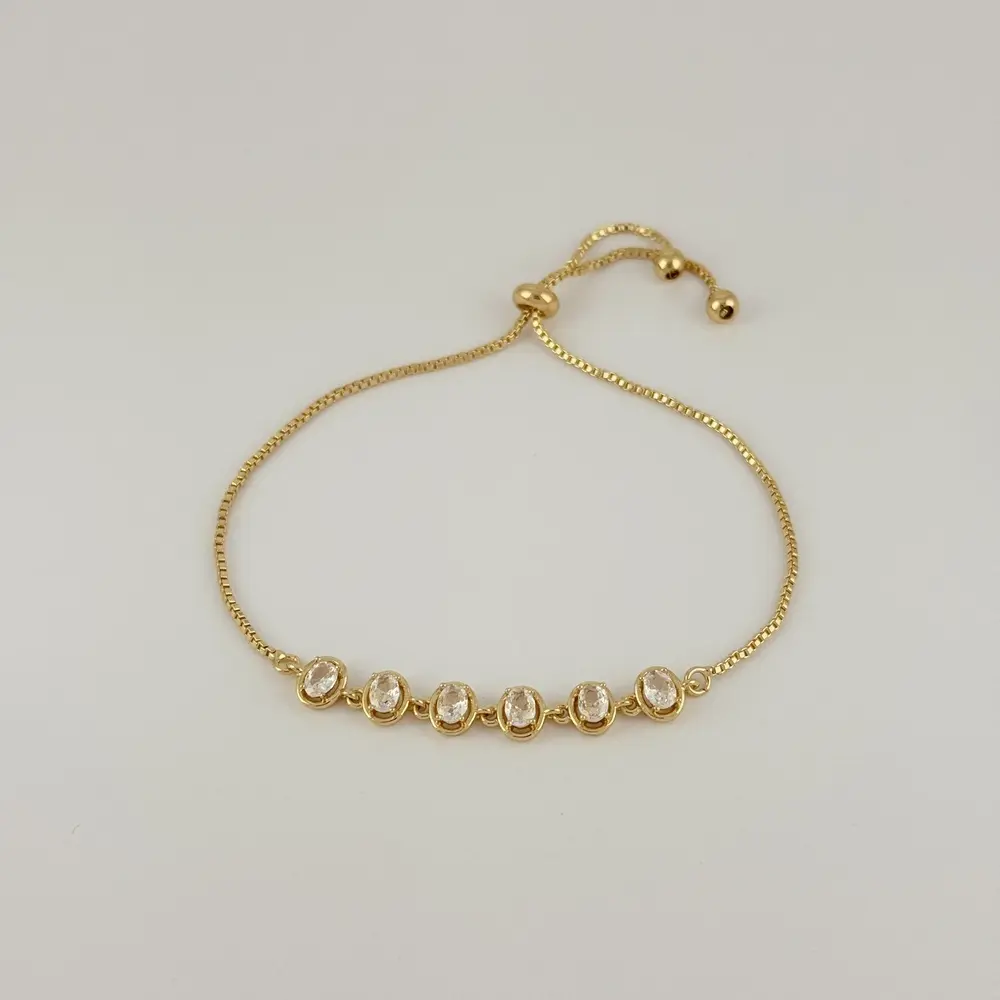 Pulsera en Rodinado Gold Champagne ajustable ovalos cristales blancos